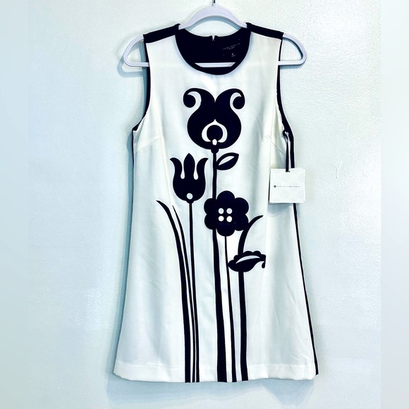 Victoria Beckham unique dress. With beautiful flower leather applications. - Picture 1 of 16